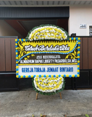 Papan Bunga Duka di Babakan Tarogong